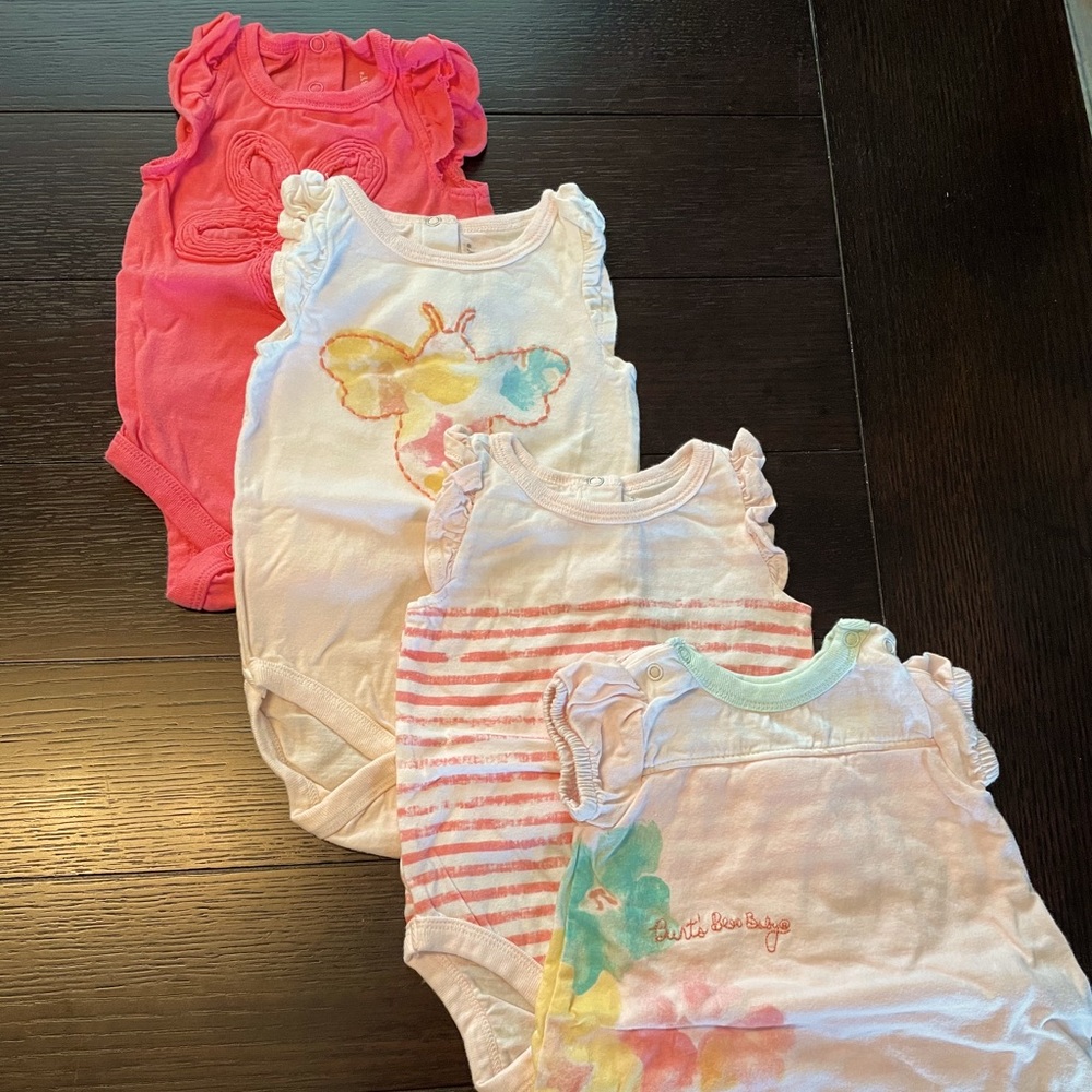 Lot of Burt’s Bees Baby Onesies